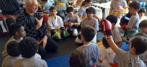 kids at a summer camp martial arts class